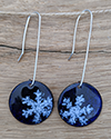 earrings with snowflakes on them